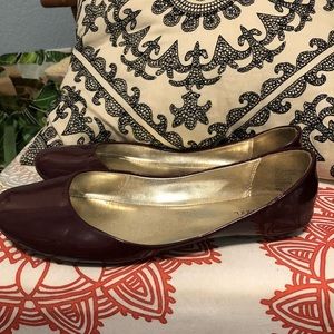 Red patent leather ballet flats